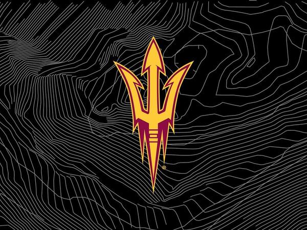 Pitchfork on black topographical background